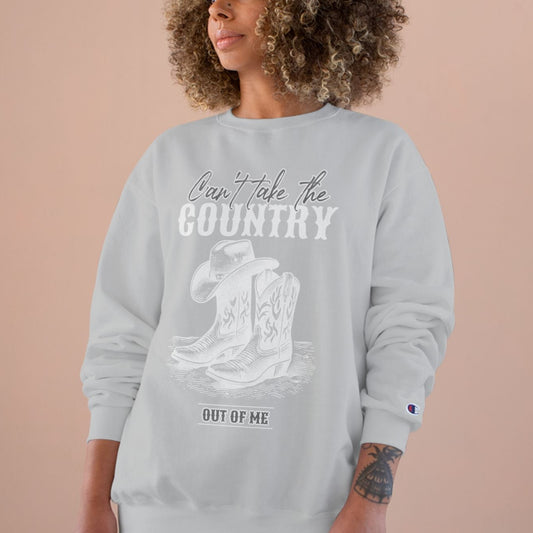 Woman wearing a gray sweatshirt with a graphic and text on a beige background